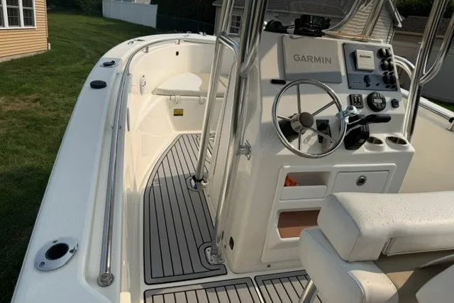 Slide: The Image of 2021 Bulls Bay 230 Center Console boat with Garmin navigation system, sleek deck design. - 27