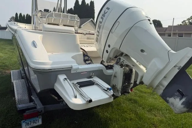 Slide: The Image of 2021 Bulls Bay 230 Center Console boat with Suzuki outboard motor on trailer. - 39