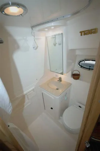 Slide: The Image of Tiara Yachts 3500 Open 2002 bathroom with sink and toilet. - 21