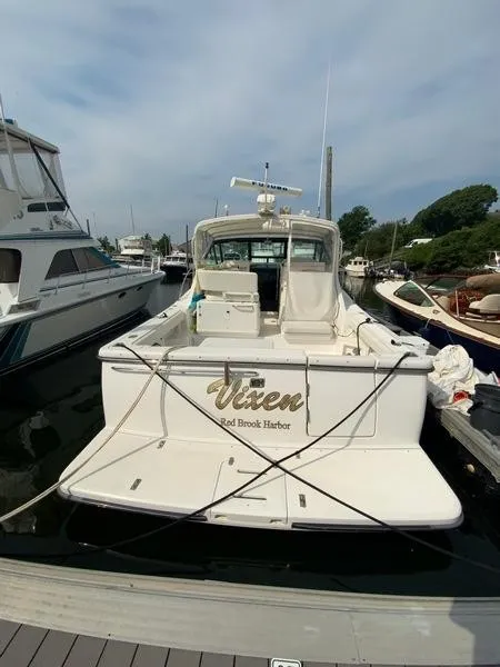 Slide: The Image of 2002 Tiara Yachts 3500 Open docked, rear view. - 32