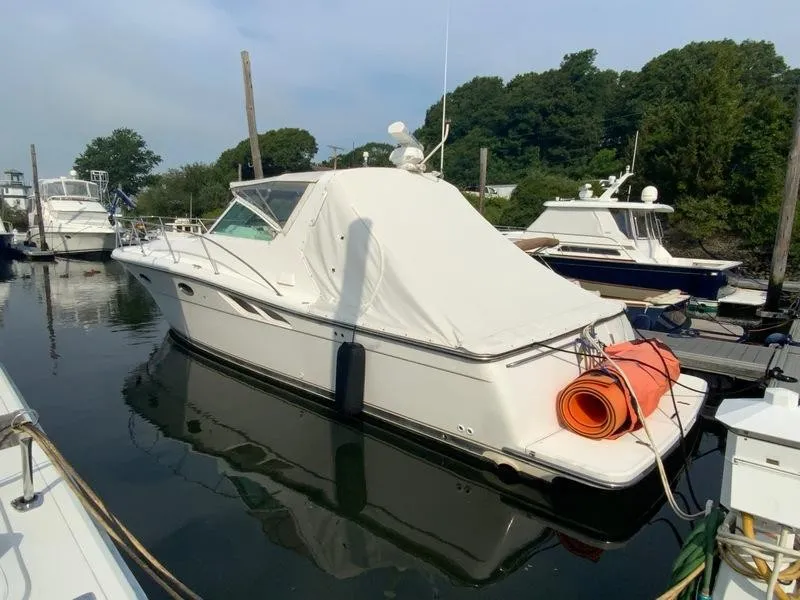 Slide: The Image of 2002 Tiara Yachts 3500 Open docked in marina. - 23