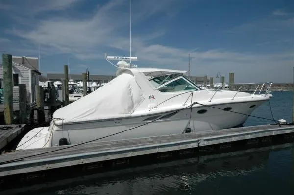 Slide: The Image of 2002 Tiara Yachts 3500 Open docked at marina. - 2