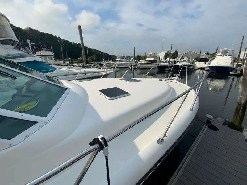 Slide: The Image of 2002 Tiara Yachts 3500 Open docked at marina. - 26