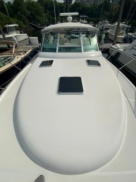 Slide: The Image of 2002 Tiara Yachts 3500 Open docked at marina. - 38