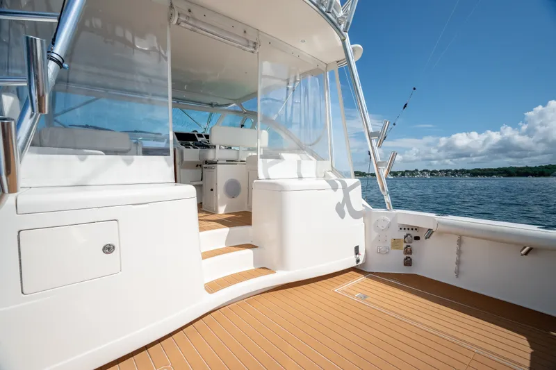 Slide: The Image of 2011 Cabo 36 Express yacht deck with ocean view and clear skies. - 26