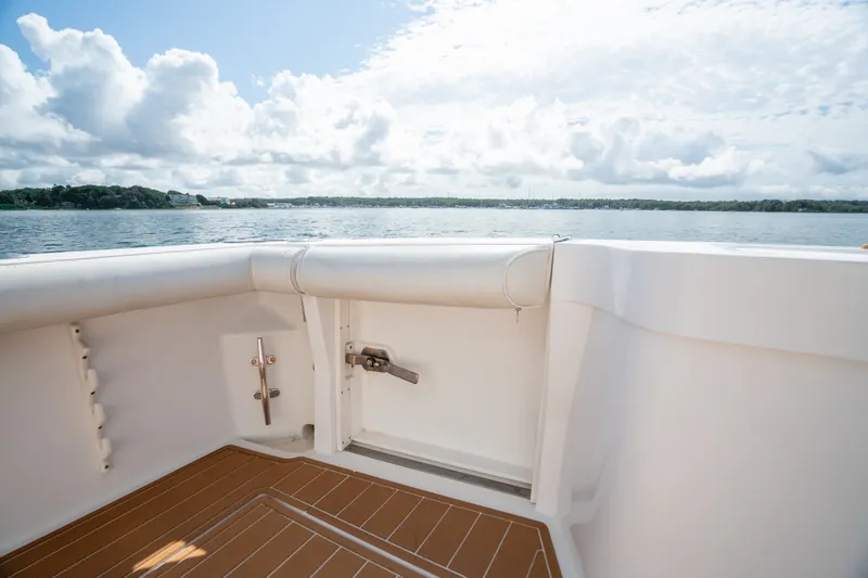 Slide: The Image of View from the deck of a 2011 Cabo 36 Express boat on a sunny day. - 27