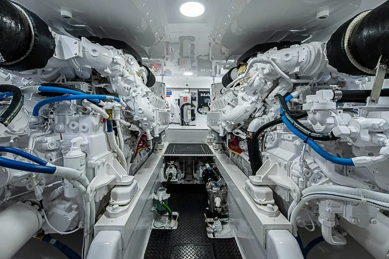 Slide: The Image of Engine room of 2026 Viking 54 Convertible yacht, showcasing advanced machinery and systems. - 56