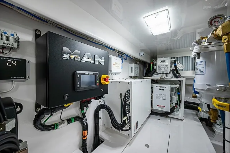 Slide: The Image of Engine room of 2026 Viking 54 Convertible yacht with MAN control system. - 59