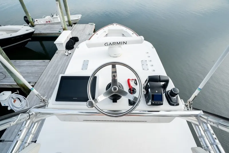 Slide: The Image of 2023 Invincible 39 Open Fisherman boat helm with Garmin navigation system. - 30
