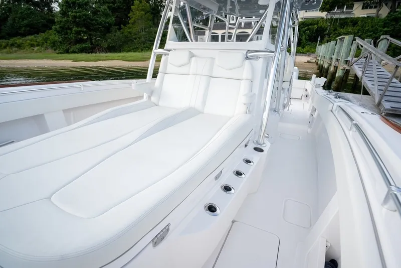 Slide: The Image of 2023 Invincible 39 Open Fisherman boat with luxurious white seating and sleek design. - 19