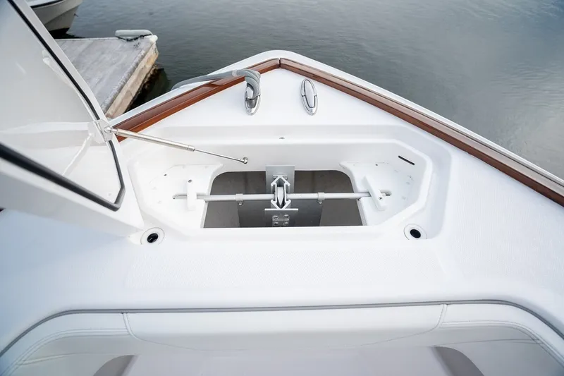 Slide: The Image of 2023 Invincible 39 Open Fisherman boat anchor compartment detail. - 23