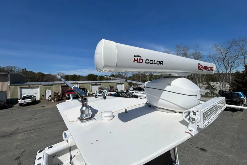 Slide: The Image of 2006 Albin 26 Center Console with Raymarine radar and Garmin equipment on deck. - 27
