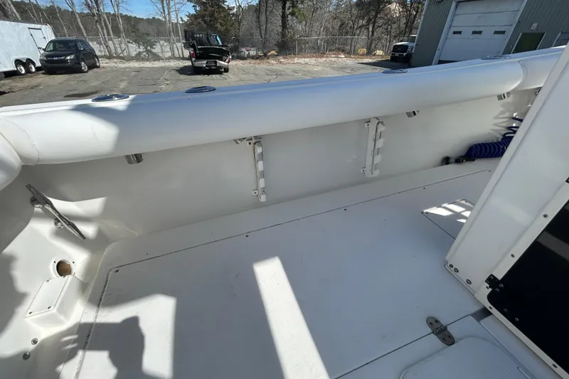 Slide: The Image of 2006 Albin 26 Center Console boat interior with white deck and seating. - 37