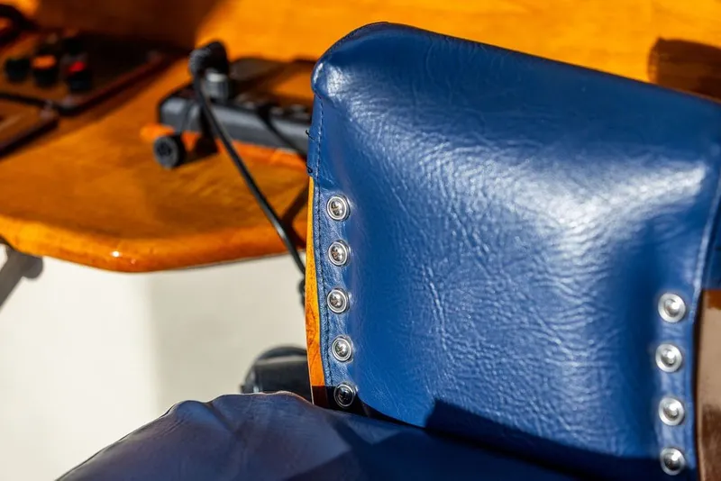 Slide: The Image of Blue leather seat detail on 1998 Hinckley Picnic Boat 36 Classic. - 27