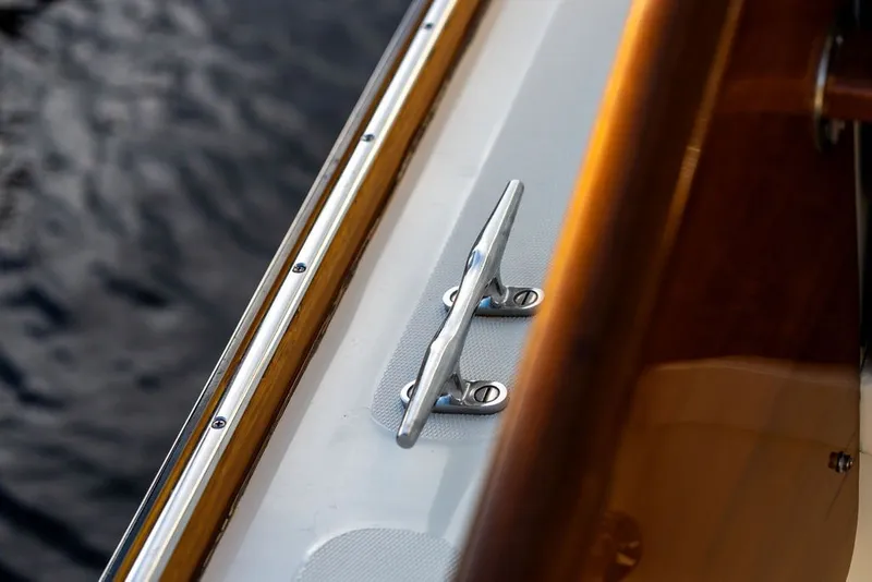 Slide: The Image of Close-up of a cleat on a 1998 Hinckley Picnic Boat 36 Classic. - 18