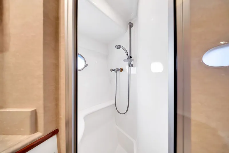 Slide: The Image of Shower area in 2007 Marquis 65 yacht, featuring sleek design and modern fixtures. - 58