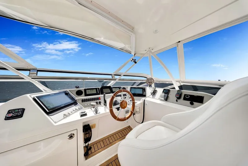 Slide: The Image of Luxurious 2007 Marquis 65 yacht helm with modern navigation equipment and ocean view. - 20