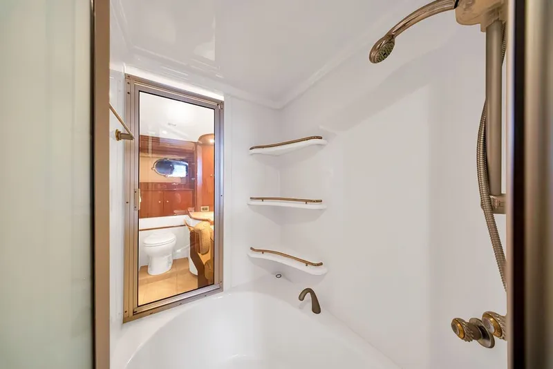 Slide: The Image of Luxurious bathroom in 2007 Marquis 65 yacht with modern shower and elegant fixtures. - 45