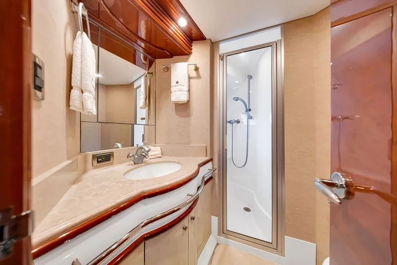Slide: The Image of Luxurious bathroom in 2007 Marquis 65 yacht with elegant fixtures and shower. - 57