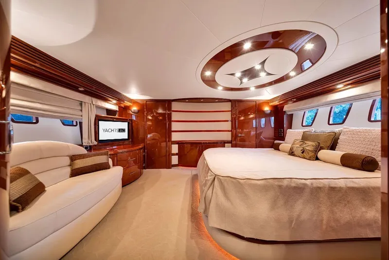 Slide: The Image of Luxurious interior of a 2007 Marquis 65 yacht with elegant furnishings and ambient lighting. - 36