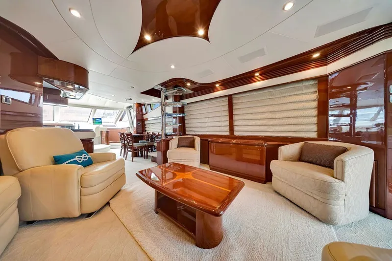 Slide: The Image of Luxurious interior of a 2007 Marquis 65 yacht with elegant seating and modern design. - 25
