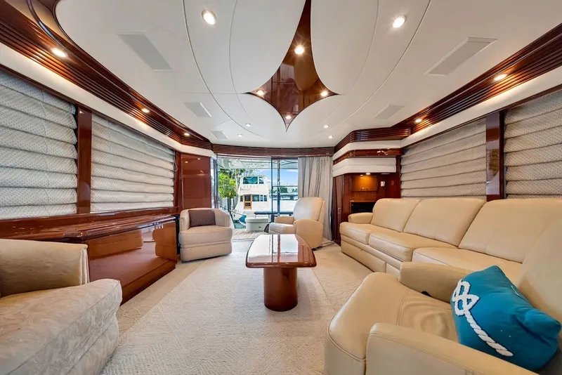 Slide: The Image of Luxurious interior of a 2007 Marquis 65 yacht with elegant seating and modern design. - 26