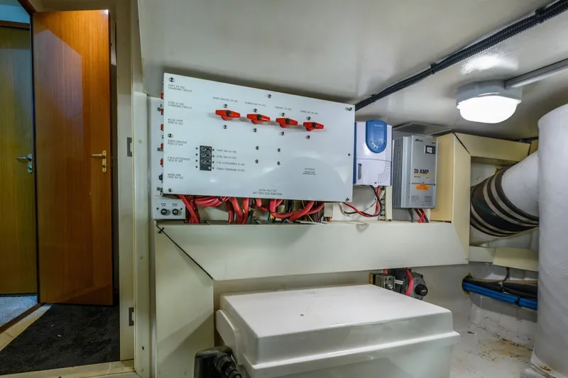 Slide: The Image of Electrical panel and equipment in 1999 Viking 60 Cockpit Motor Yacht engine room. - 40