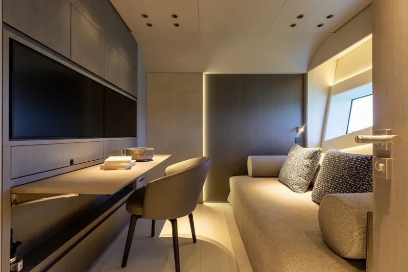 Slide: The Image of Luxurious interior of 2024 Mangusta 104 REV yacht, featuring modern design and cozy seating. - 46