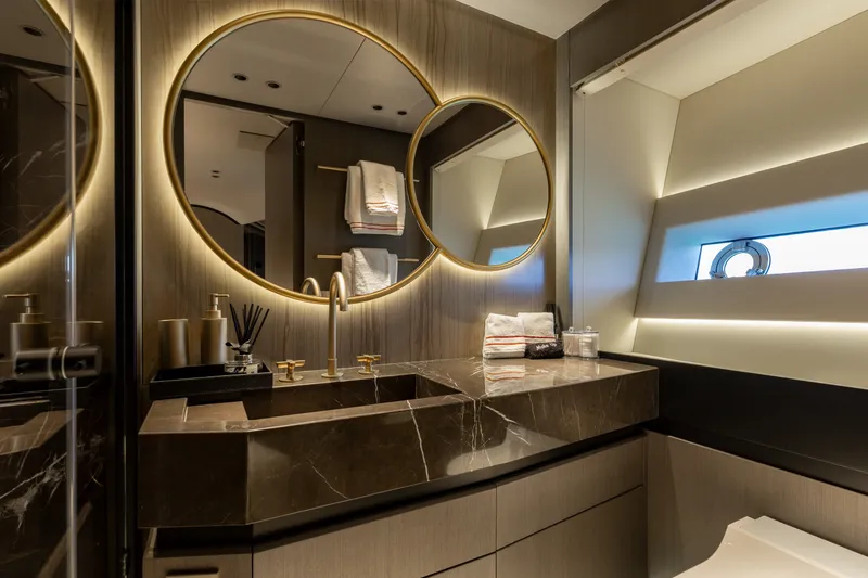 Slide: The Image of Luxurious bathroom in 2024 Mangusta 104 REV yacht with elegant design and modern fixtures. - 40