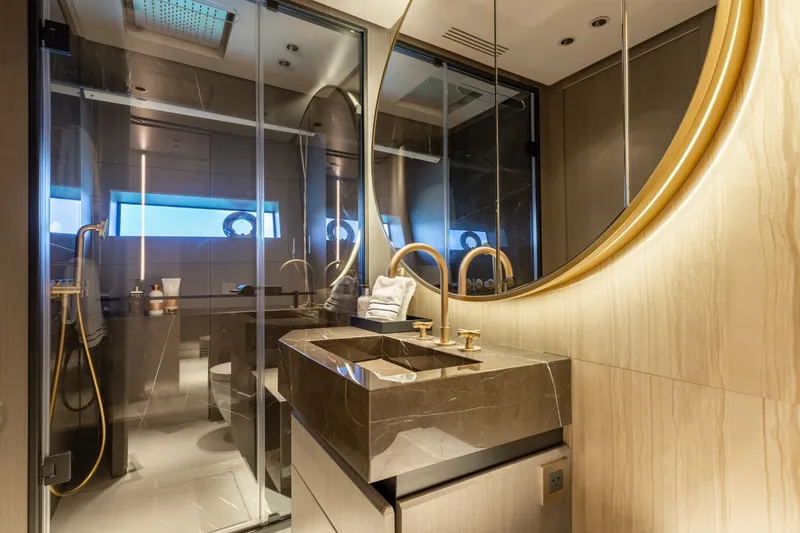 Slide: The Image of Luxurious bathroom interior of 2024 Mangusta 104 REV yacht with elegant fixtures and modern design. - 43