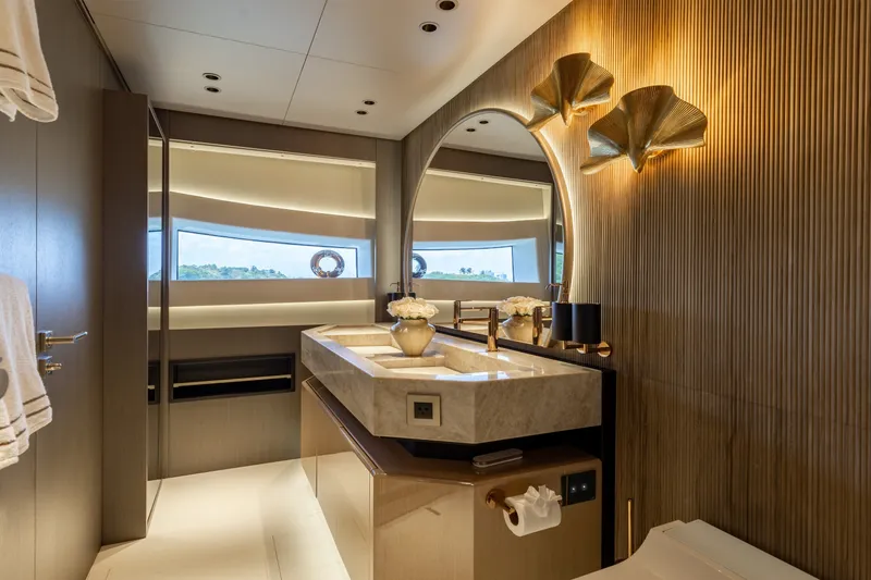 Slide: The Image of Luxurious bathroom interior of 2024 Mangusta 104 REV yacht with elegant fixtures and decor. - 34