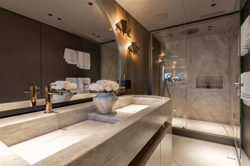 Slide: The Image of Luxurious bathroom in 2024 Mangusta 104 REV yacht, featuring marble sink and elegant fixtures. - 32