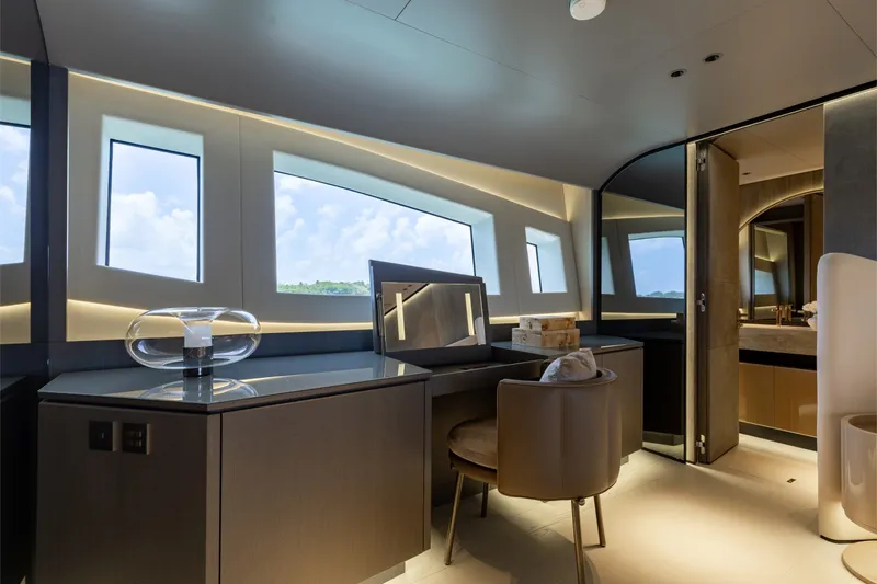 Slide: The Image of Luxurious interior of 2024 Mangusta 104 REV yacht with modern design and elegant furnishings. - 28