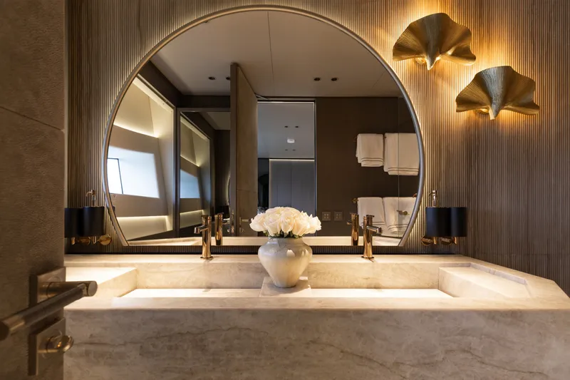 Slide: The Image of Luxurious bathroom on 2024 Mangusta 104 REV yacht with elegant decor and modern fixtures. - 30