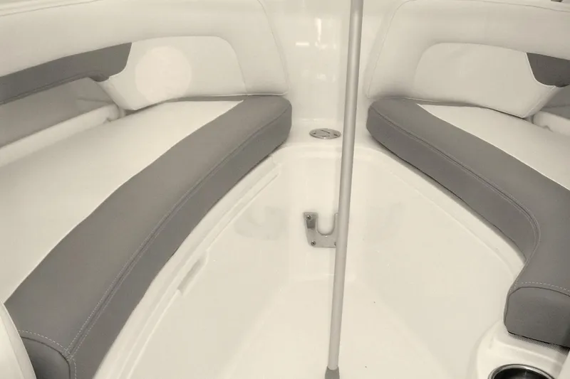Slide: The Image of 2024 Albemarle 27 Dual Console interior with gray cushioned seating. - 32