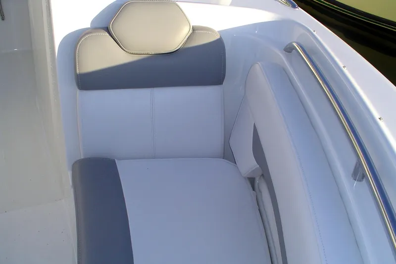 Slide: The Image of 2024 Albemarle 27 Dual Console boat seating with gray and white upholstery. - 36