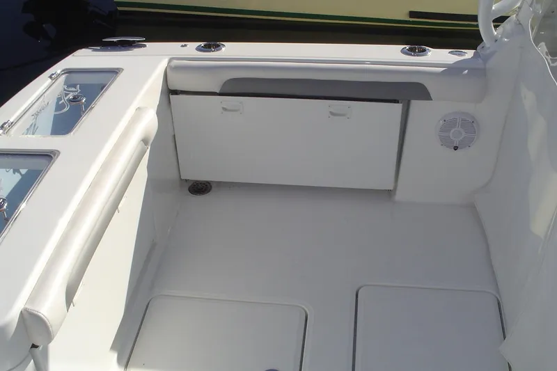Slide: The Image of 2024 Albemarle 27 Dual Console boat interior with storage and speaker. - 41