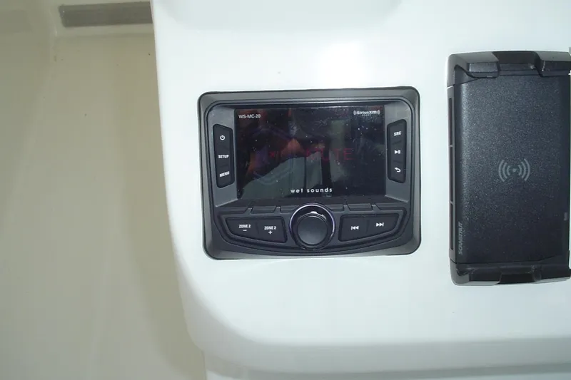 Slide: The Image of 2024 Albemarle 27 Dual Console audio system with Wet Sounds control panel. - 25