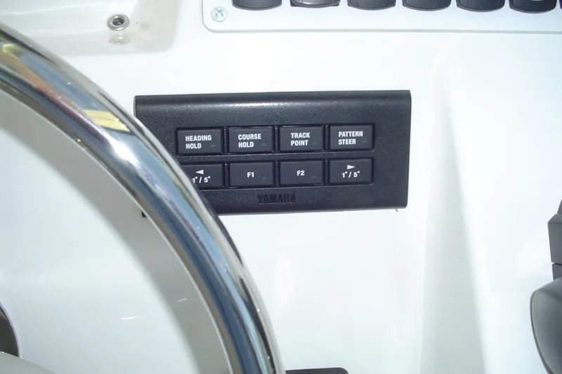 Slide: The Image of Control panel of 2024 Albemarle 27 Dual Console boat with steering wheel. - 23