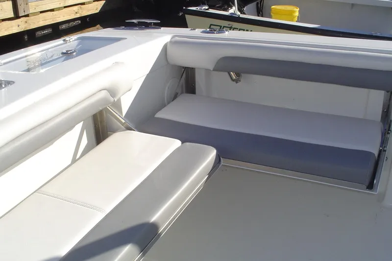 Slide: The Image of 2024 Albemarle 27 Dual Console boat interior with cushioned seating. - 42