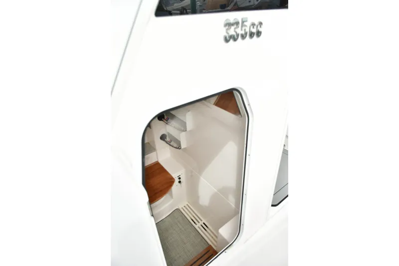 Slide: The Image of Interior view of 2022 Everglades 335 Center Console boat cabin. - 29