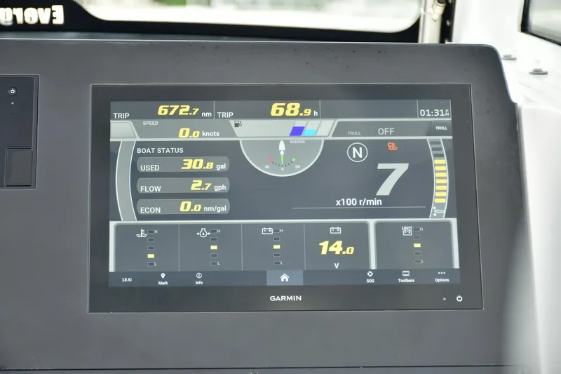 Slide: The Image of Display screen of 2022 Everglades 335 Center Console showing trip and boat status data. - 10