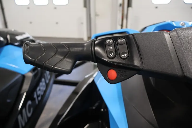 Slide: The Image of Close-up of 2018 Sea-Doo RXT 230 handlebar controls with VTS, Sport, and Eco buttons. - 14