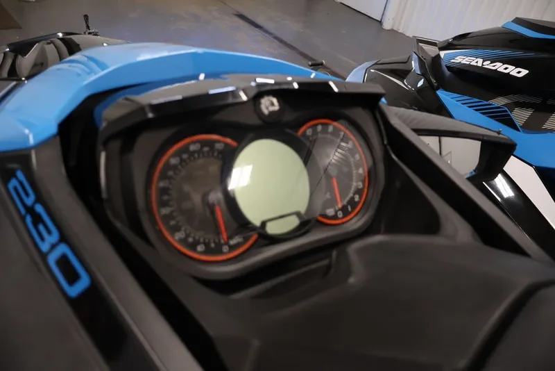 Slide: The Image of 2018 Sea-Doo RXT 230 dashboard with speedometer and controls in focus. - 26