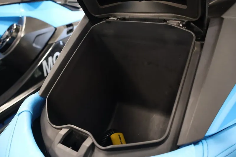 Slide: The Image of Open storage compartment of 2018 Sea-Doo RXT 230 watercraft, showcasing interior space. - 25