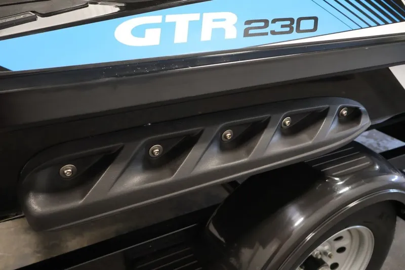 Slide: The Image of 2018 Sea-Doo RXT 230 jet ski detail with GTR 230 branding on trailer. - 36