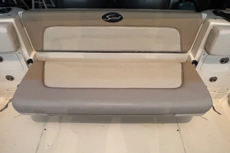Slide: The Image of 2007 Scout 262 Abaco boat seat with beige upholstery and Scout logo. - 13