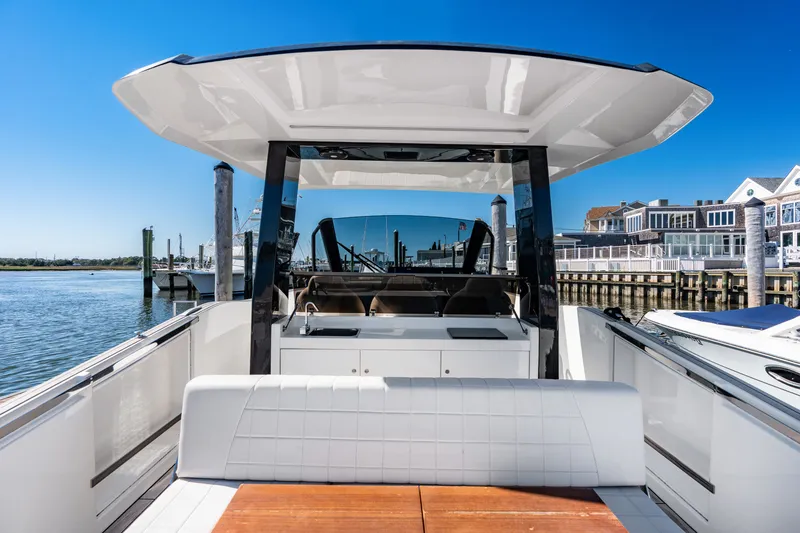 Slide: The Image of The image shows the cockpit of a 2023 Astondoa 377 Coupe Outboard with a modern design. - 41