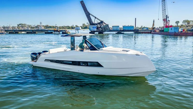Slide: The Image of A modern 2023 Astondoa 377 Coupe Outboard cruising on calm waters. - 15
