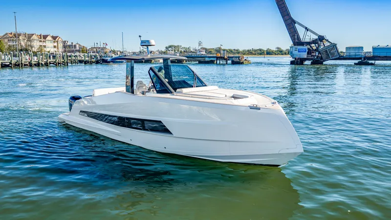 Slide: The Image of A modern 2023 Astondoa 377 Coupe Outboard cruising on calm waters. - 17